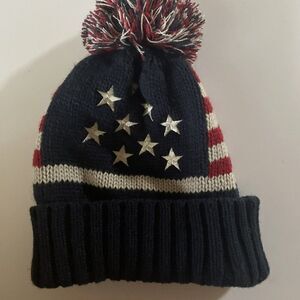 stars and stripes puffball winter beanie
